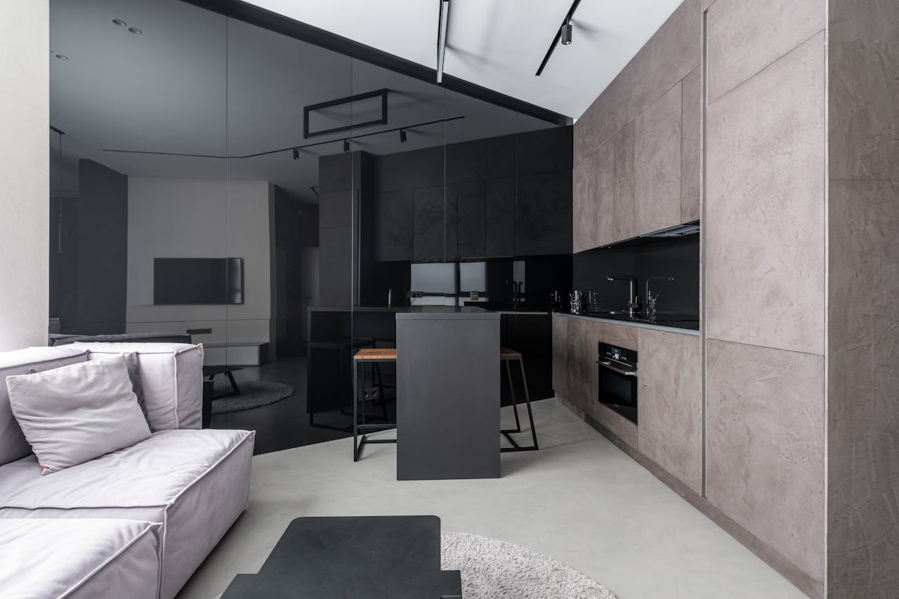 Sleek contemporary apartment kitchen with modern design elements and minimalist decor.